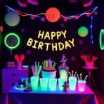 Neon glow party setup with blacklights and glowing decorations for teen birthday
