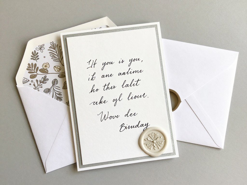 A handmade birthday card with elegant finishing touches including a decorative envelope and wax seal A handmade birthday card with elegant finishing touches including a decorative envelope and wax seal