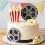 A movie-themed birthday cake featuring elements from a popular film with realistic fondant decorations