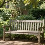 A peaceful garden bench with sunlight filtering through trees, symbolizing a place of reflection on mom's heavenly birthday