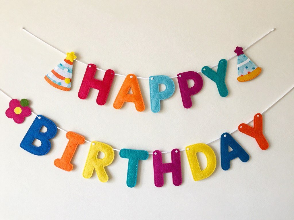 Handmade felt happy birthday banner in bright colors Handmade felt happy birthday banner in bright colors