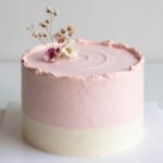 aesthetic cake designs korean featuring minimalist pastel layers with delicate floral accents
