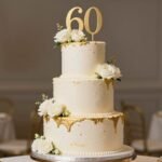 elegant 60th birthday cake ideas for mom with gold decorations and fresh flowers